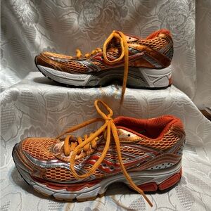 Women’s orange and silver Saucony Running Shoes Size 6.5